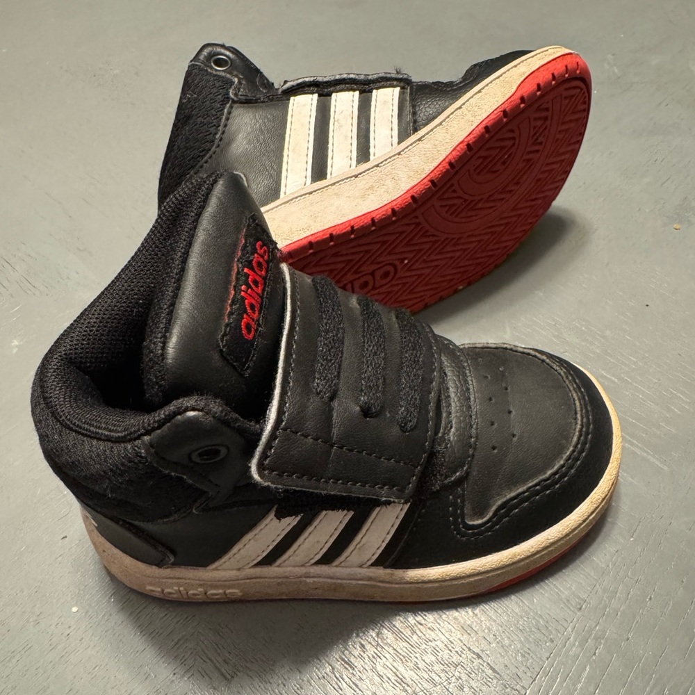 Adidas Kids Black, White, and Red High Top Sneakers